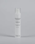 SNOA wrinkle repair day cream bottle on a gray background