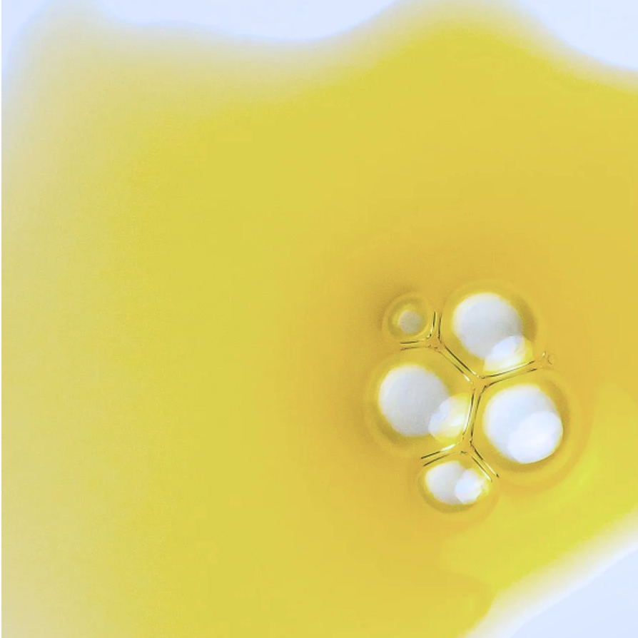 Close-up of a bakuchiol serum on a white background