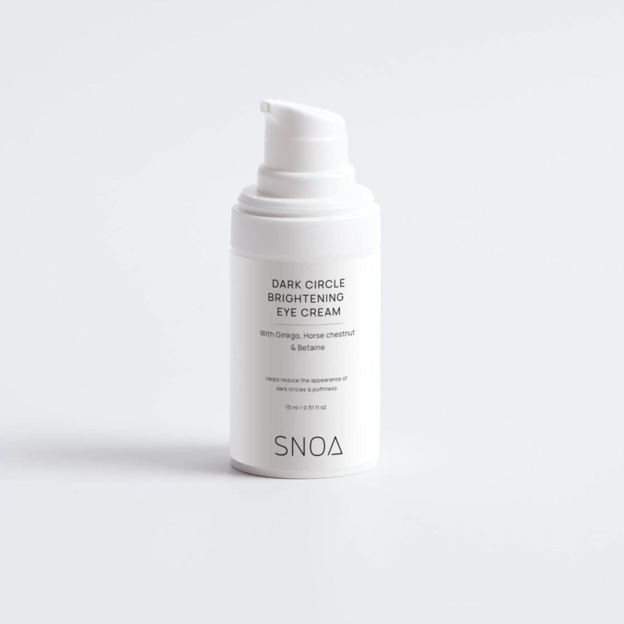 White eye cream bottle labeled 'SNOA' on a white background