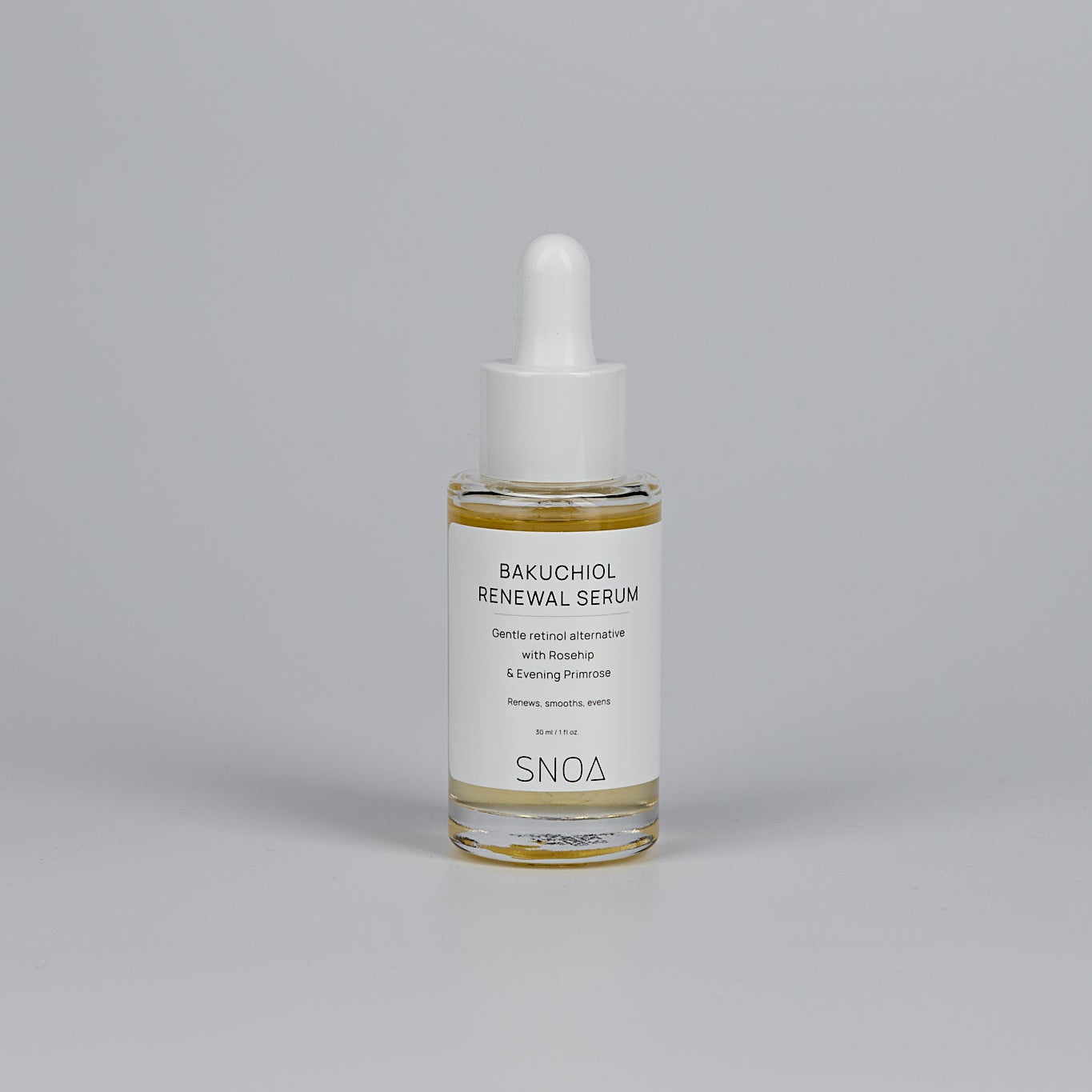 SNOA Bakuchiol Renewal Serum bottle on a gray background