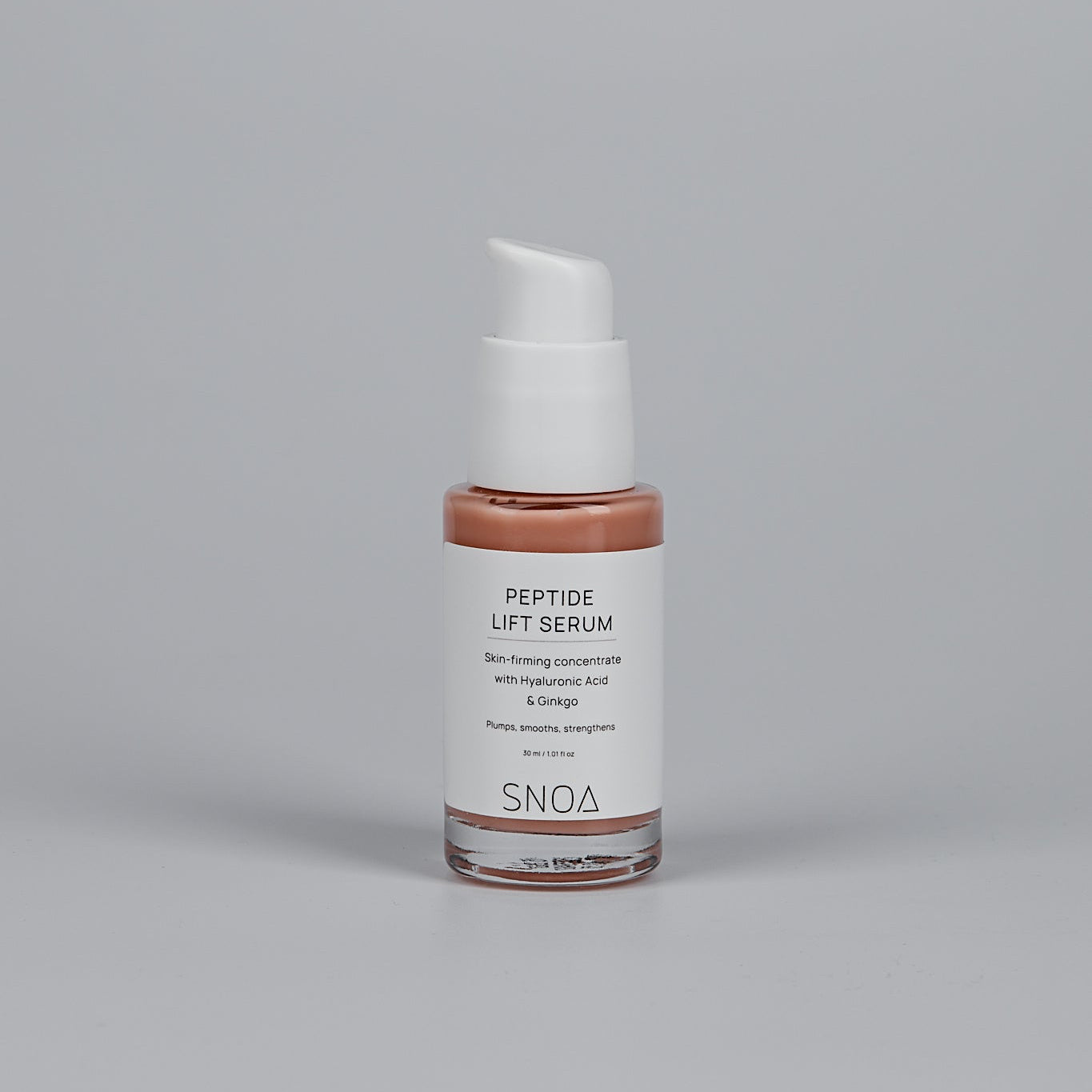 SNOA Peptide Lift Serum bottle on a gray background