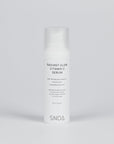 SNOA Radiant Glow Vitamin C Serum bottle on a light gray background
