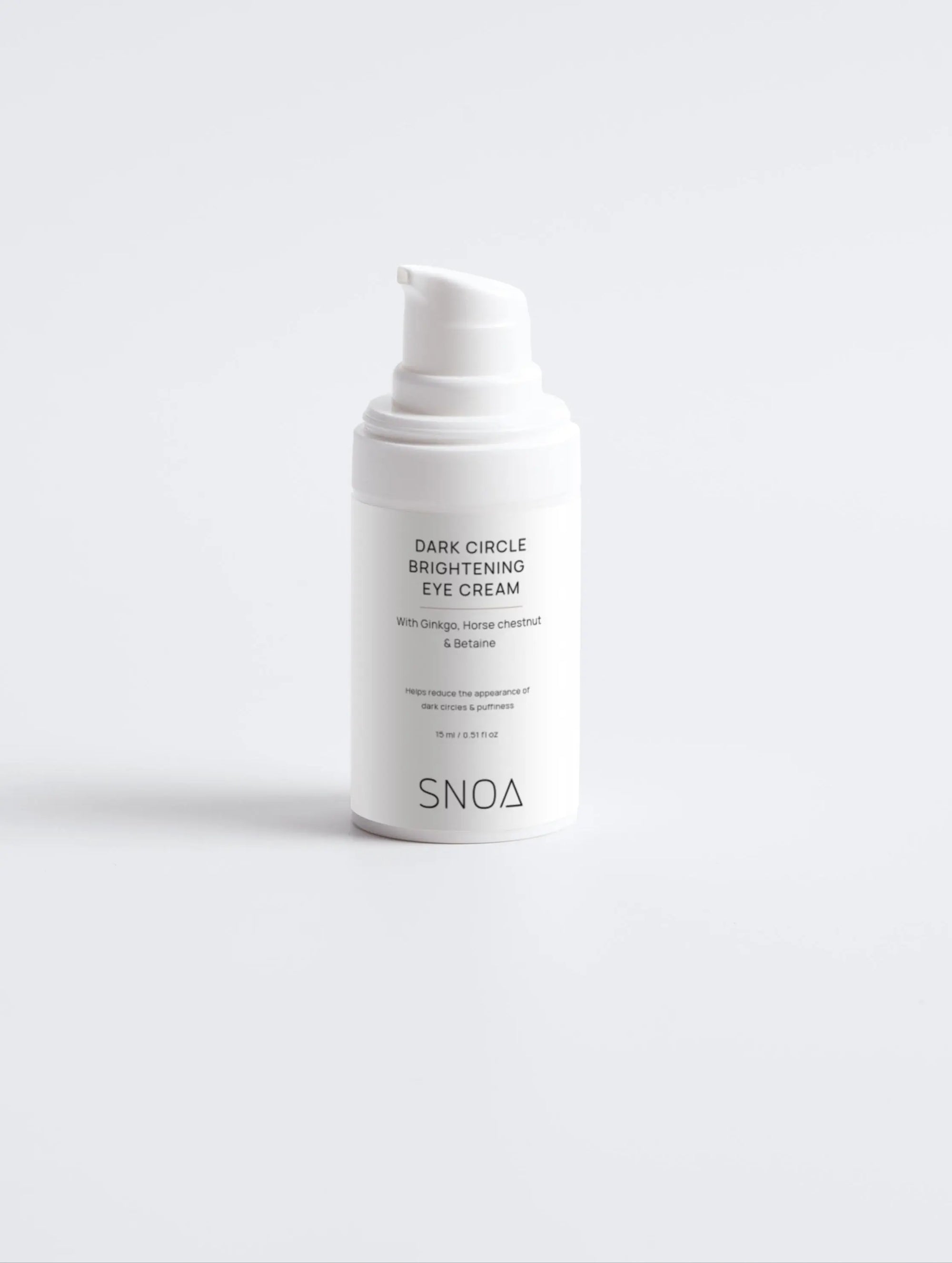White eye cream bottle labeled 'SNOA' on a white background